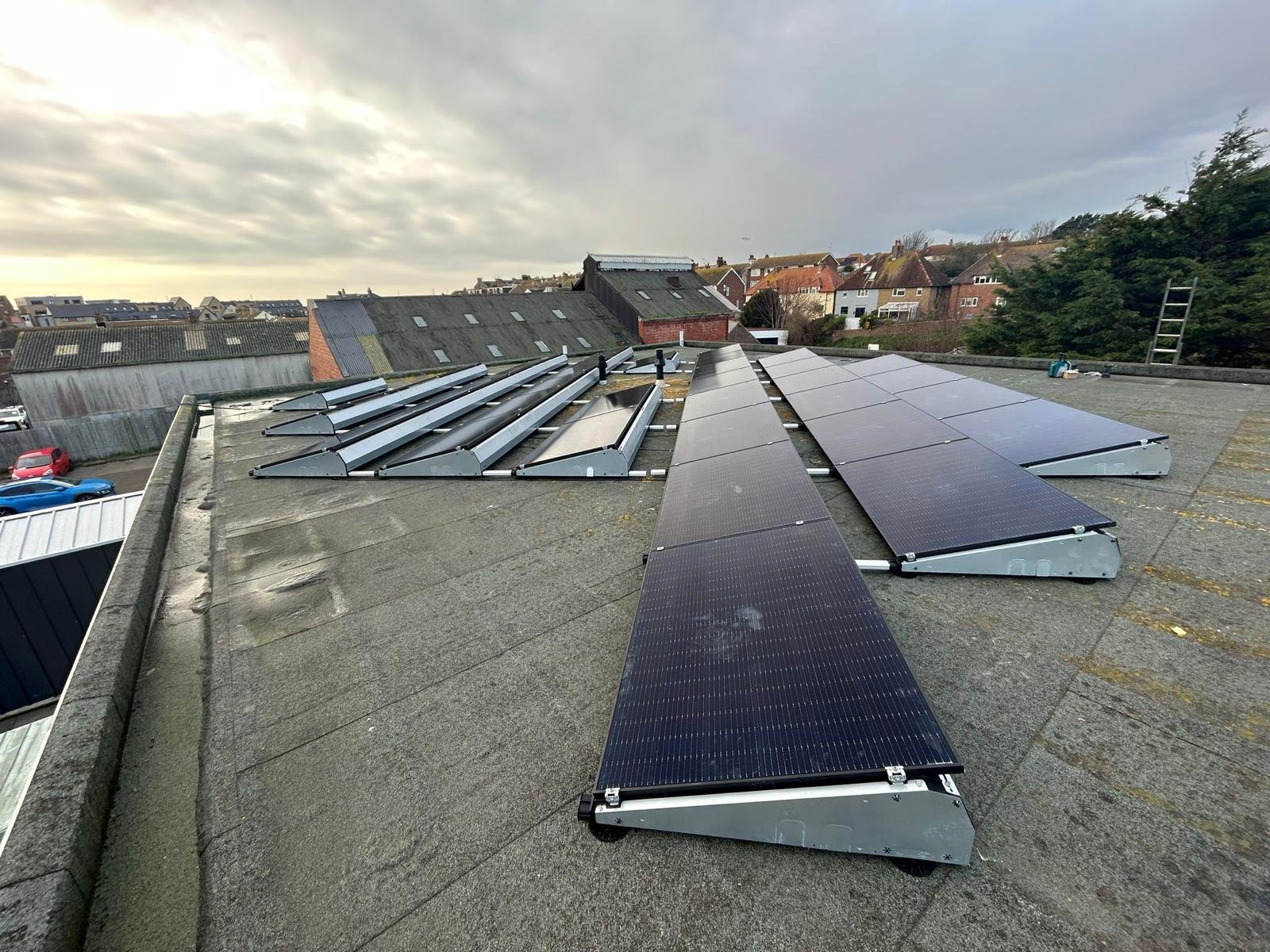 Flat roof solar panel mounting system installed on a commercial building