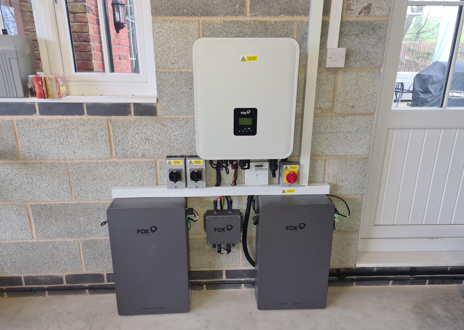Fox ESS inverter with twin battery modules mounted in a Hampshire garage